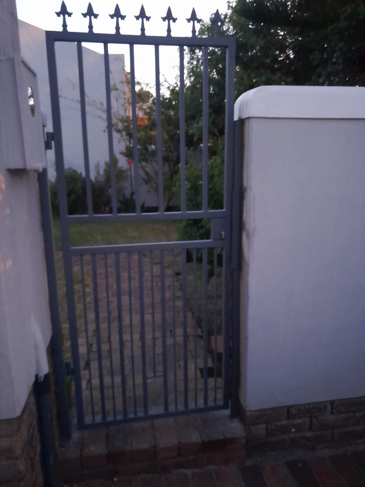 Garden gate with spear tops