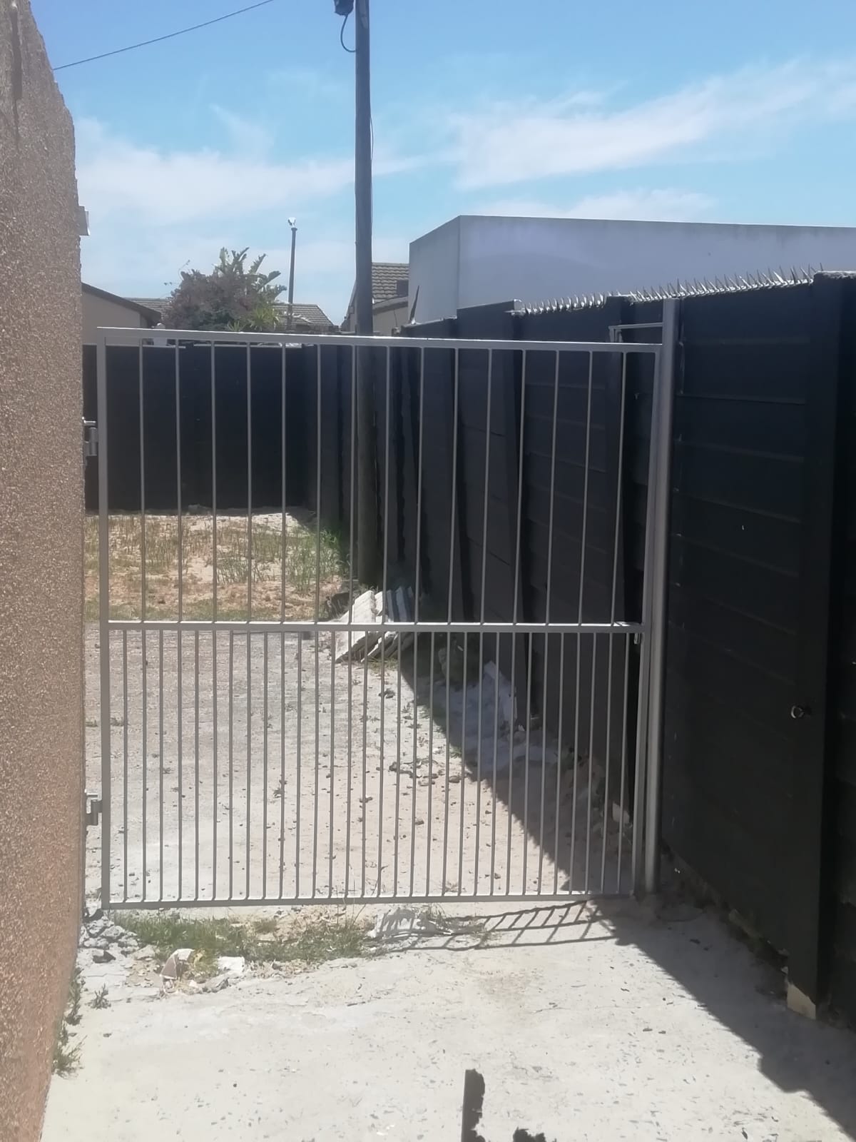 Slider gate with track installation